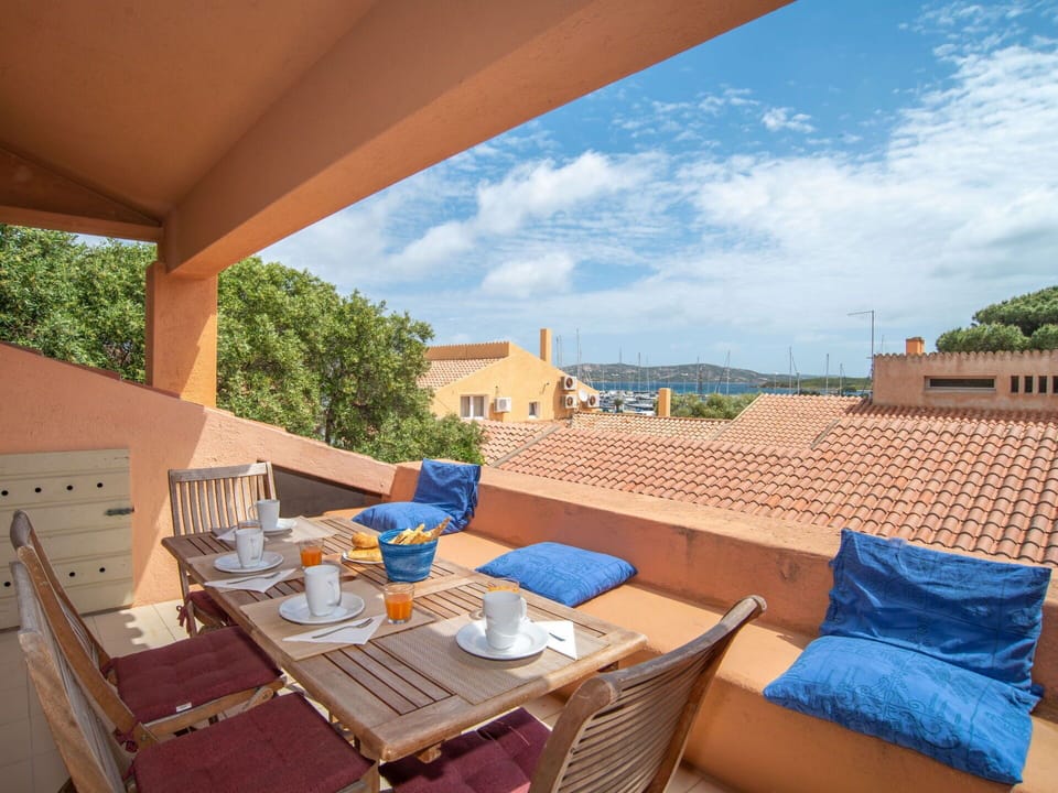 Table, Furniture, Building, Property, Cloud, Sky, Blue, Chair, Outdoor Furniture, Wood