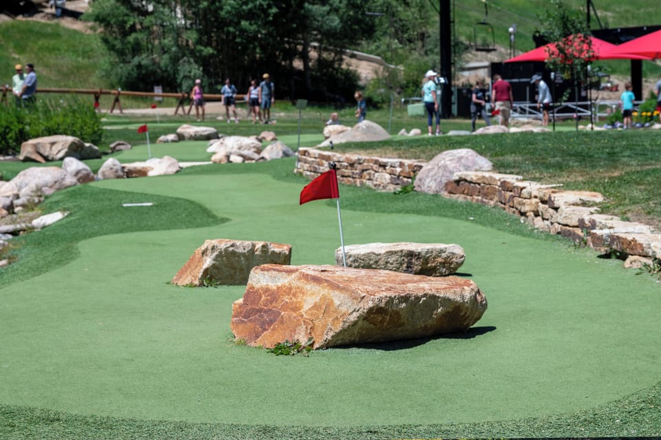 Fun putt-putt golf under the summer sun.