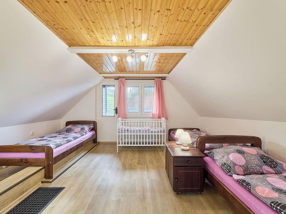 Wood, Floor, Flooring, Interior Design, Bedroom, Bed, Furniture, Room, Ceiling, Bedding