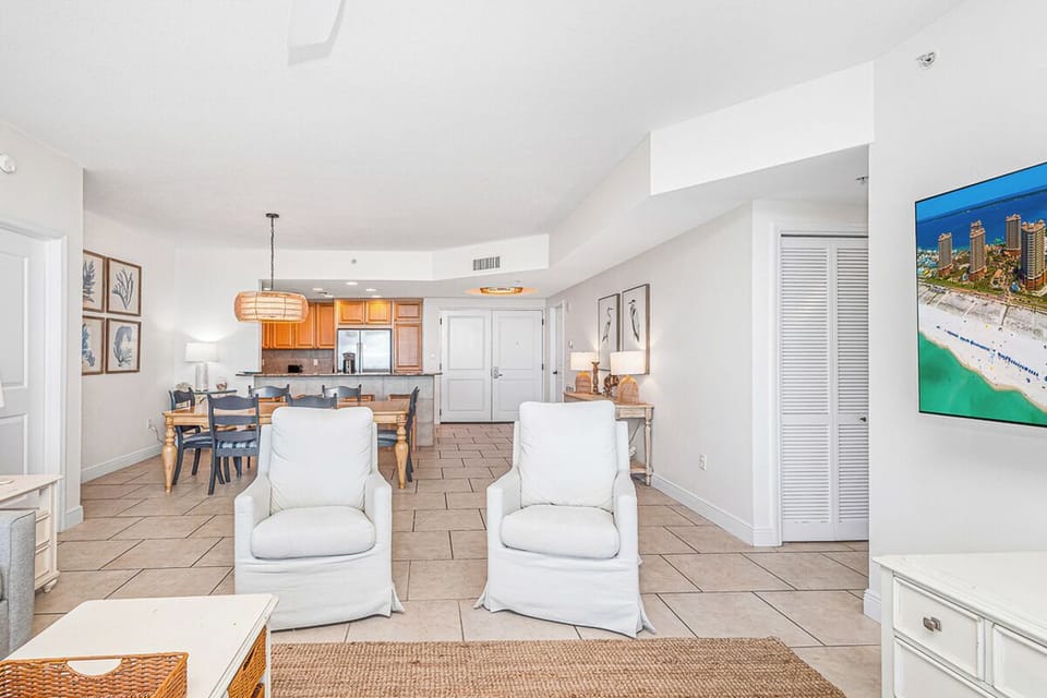 Relax in your bright, open-concept suite where coastal comfort meets modern style, with tile floors and ocean views.