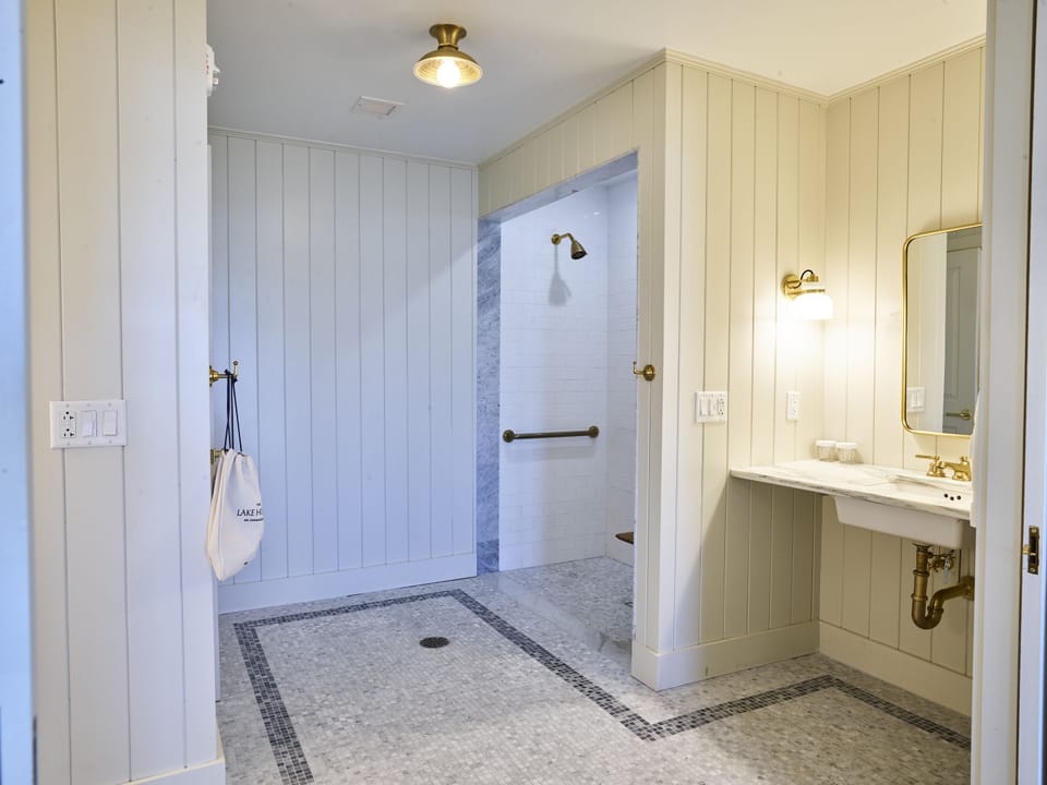 Rainfall showerhead, designer toiletries, hair dryer, bathrobes
