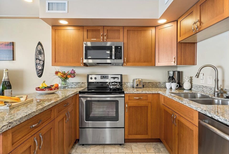 Enjoy cooking in your fully equipped kitchen with wooden cabinets
