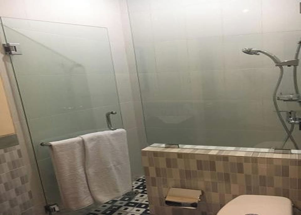 Standard Double Room, Garden View | Bathroom | Shower, rainfall showerhead, free toiletries, towels