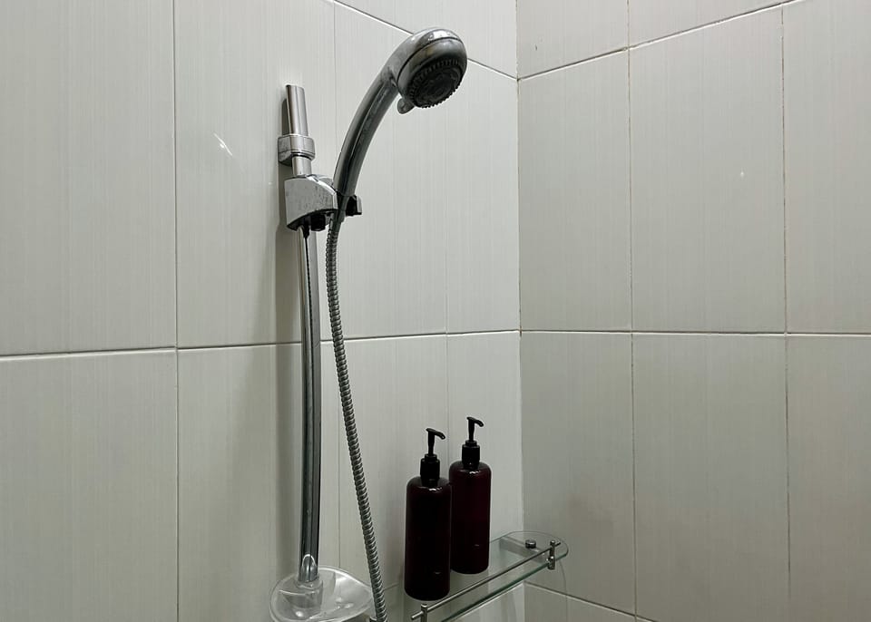 Standard Double Room, Garden View | Bathroom | Shower, rainfall showerhead, free toiletries, towels