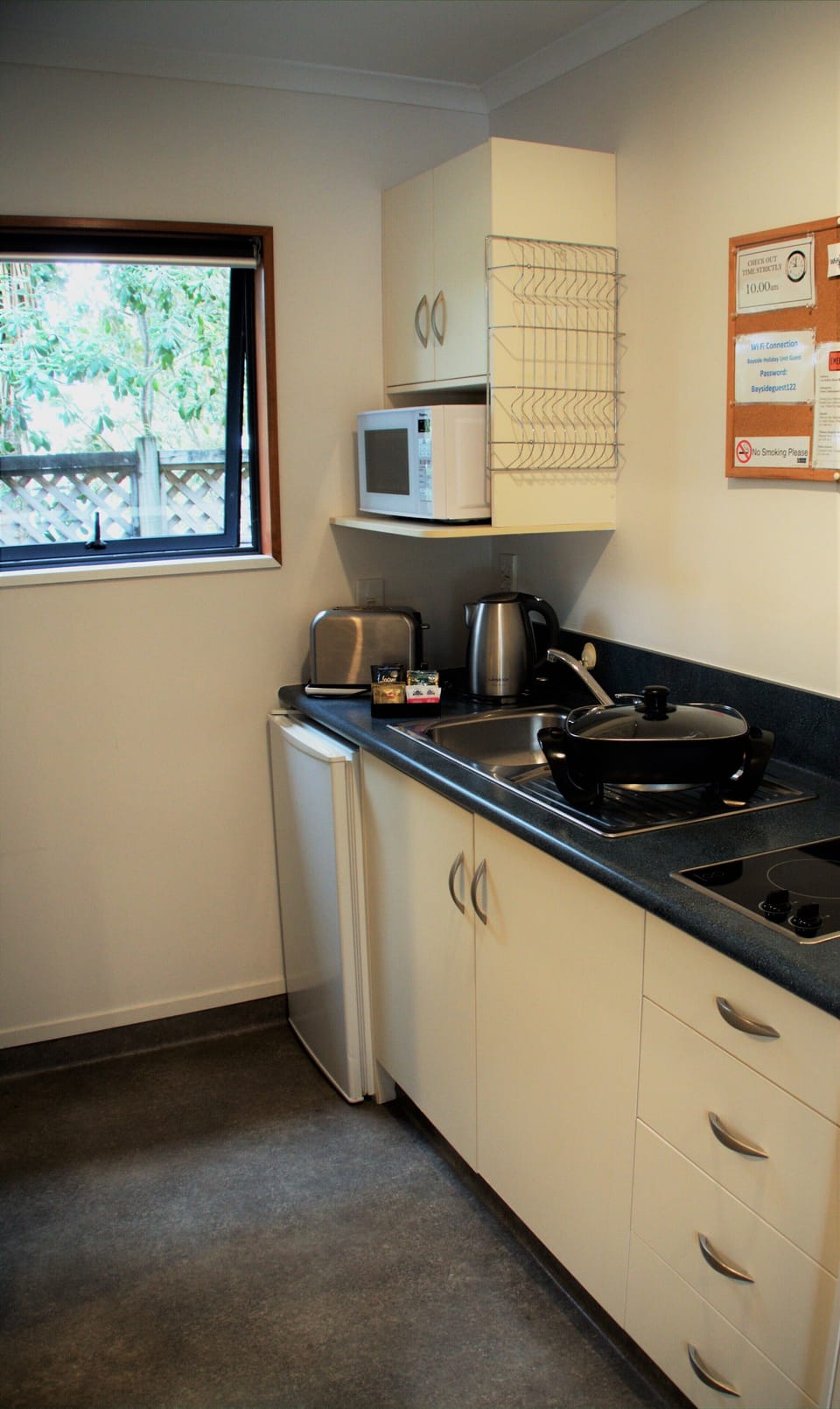 Fridge, coffee/tea maker, electric kettle, toaster