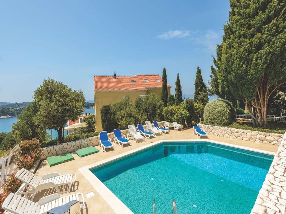 Apartment (Two Bedroom Apartment with pool) | Pool | Seasonal outdoor pool, pool umbrellas, sun loungers