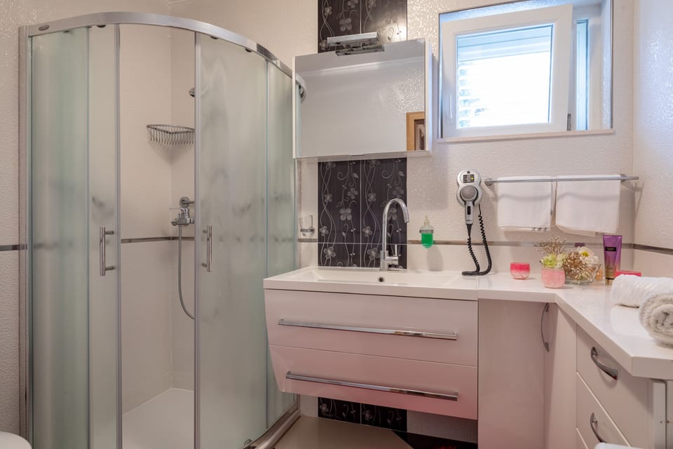 Apartment (Two Bedroom Apartment with pool) | Bathroom | Shower, towels