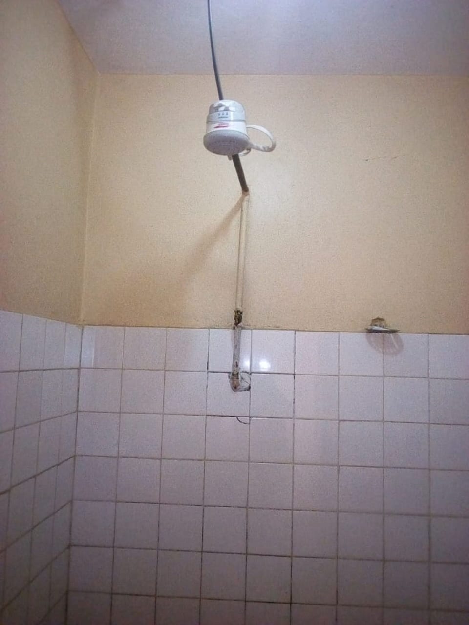Shower, rainfall showerhead, slippers, towels