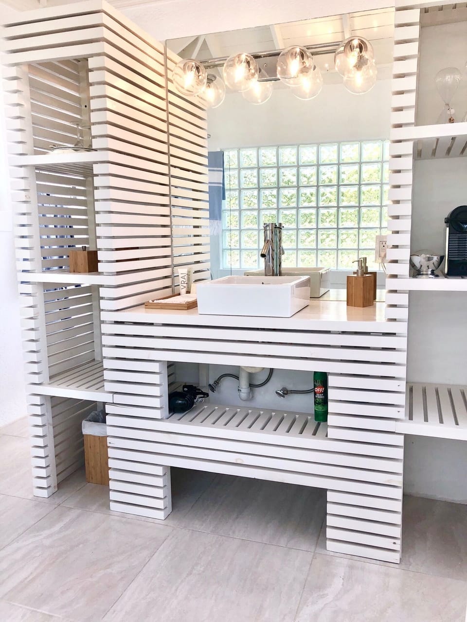 The main bathroom with lots of storage space. Very light.