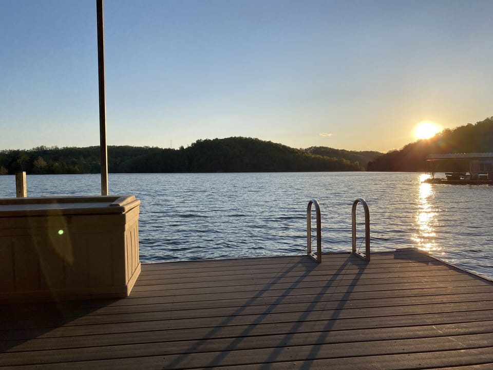 Sunset from loveseat on dock.