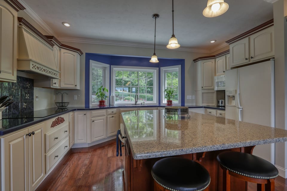 kitchen w large island and double ovens