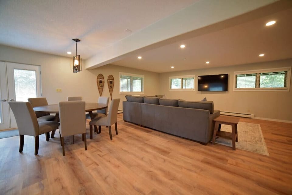 Lower level living area with walk-out french doors.  Great spot to view wild-life.