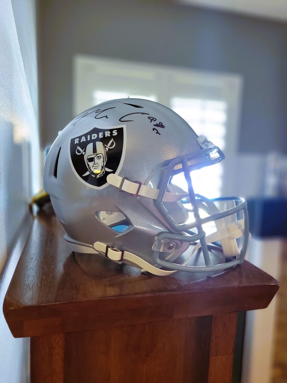 Check out the Kony Ealy signed Raiders helmet on the bookshelf in the main room!