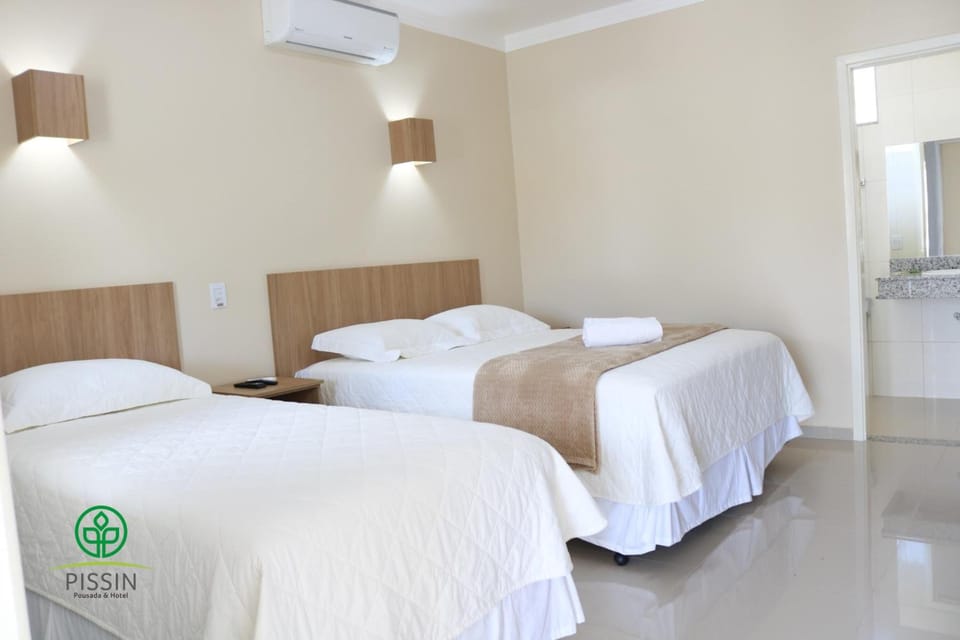 Standard Triple Room | Minibar, desk, iron/ironing board, free WiFi