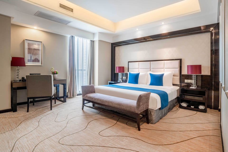 Superior Suite | In-room safe, desk, laptop workspace, blackout drapes