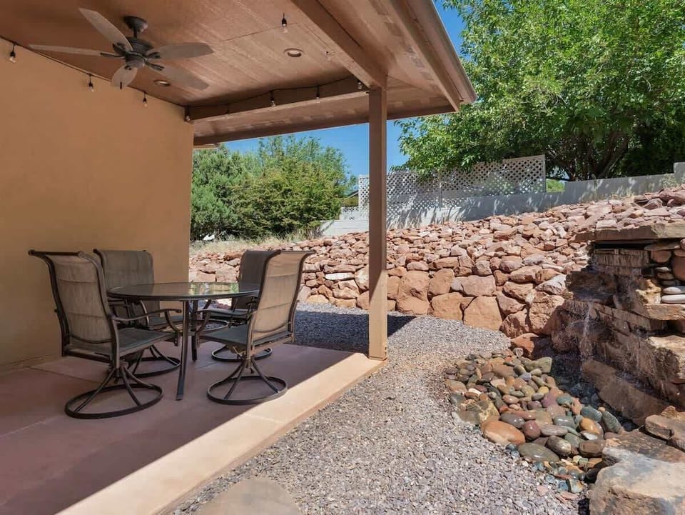 Back Yard Covered Patio off Main House with Water Feature to enjoy your coffee