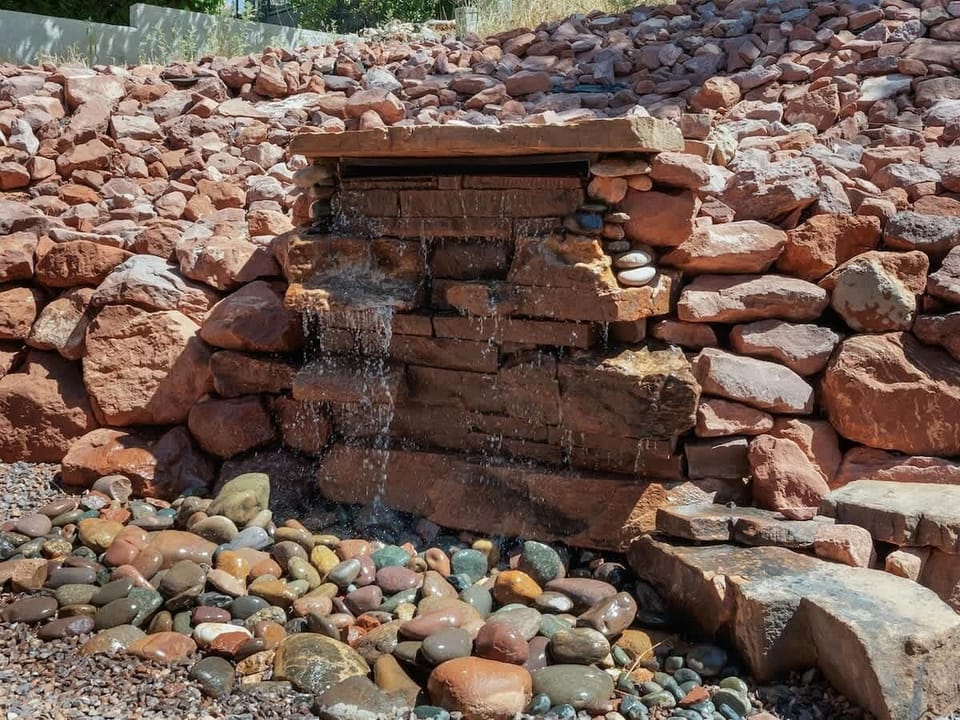 Stone Waterfall Feature for the full experinece of peace & tranquility
