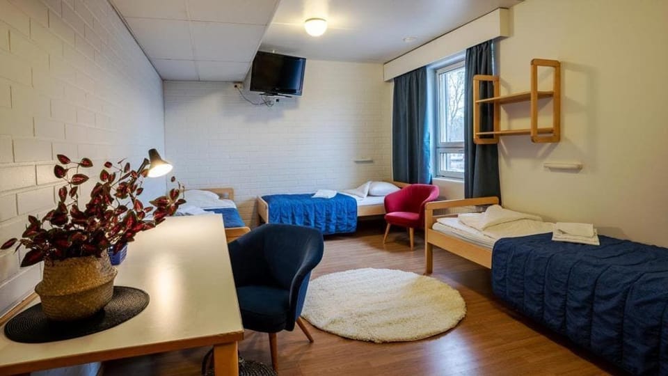 Basic Quadruple Room | Desk, iron/ironing board, free WiFi, bed sheets