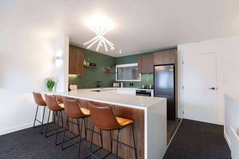 Modern, fully equipped kitchen, with complimentary condiments, spices, tea, coffee and all the utensils you'll need to cook a great meal.