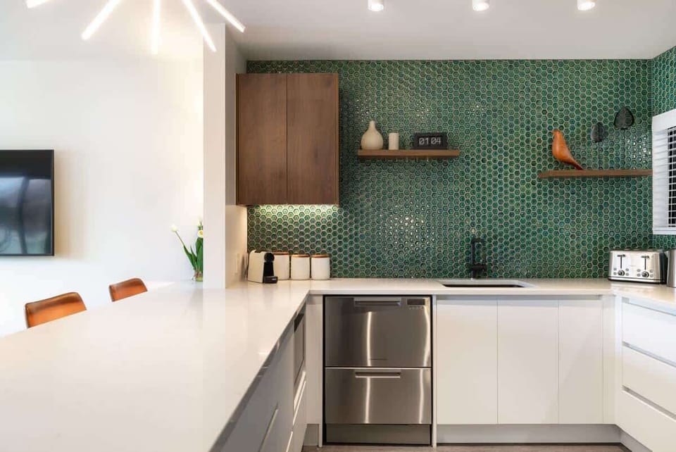 Modern, fully equipped kitchen, with complimentary condiments, spices, tea, coffee and all the utensils you'll need to cook a great meal.