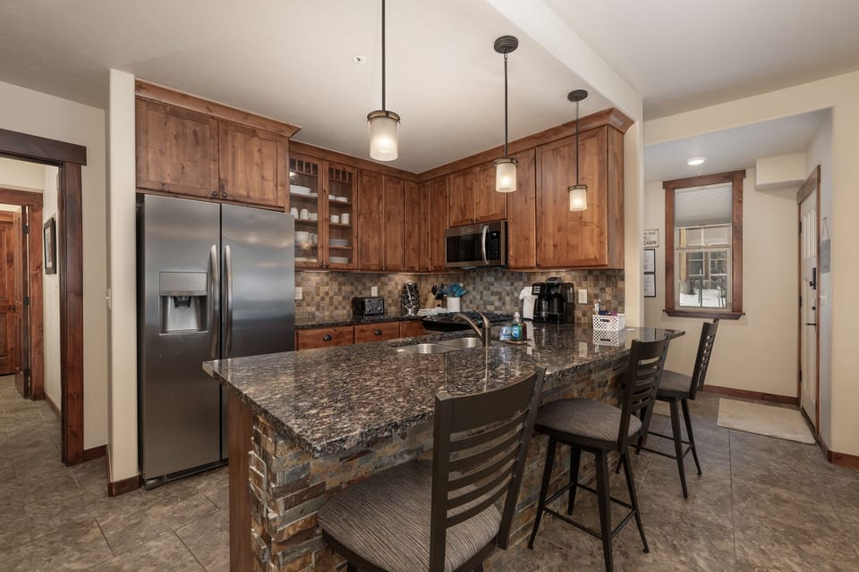 Condo, 2 Bedrooms | Private kitchen | Fridge, microwave, oven, dishwasher
