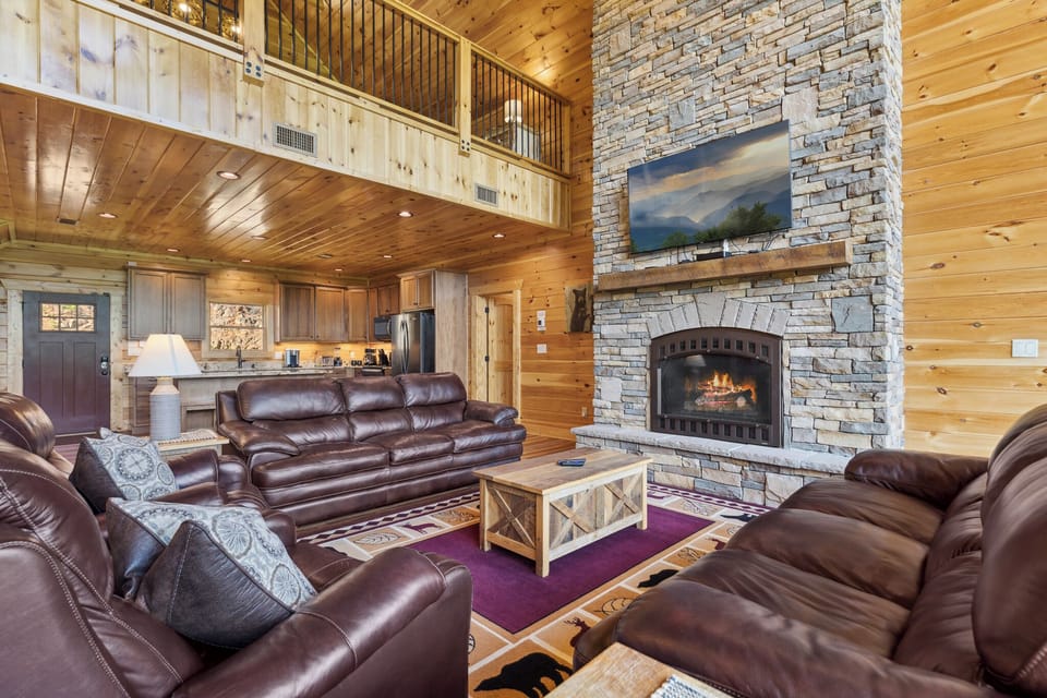 Enjoy a fire in the great room with stone fireplace and surround