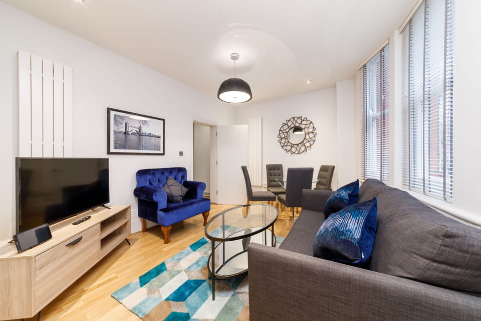 Apartment, 1 Bedroom | Living area | 32-inch flat-screen TV with digital channels, TV