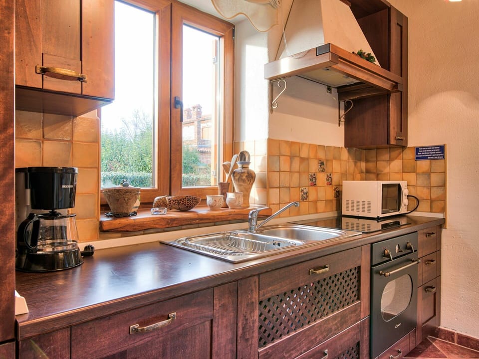 Brown, Countertop, Cabinetry, Kitchen Sink, Property, Sink, Tap, Furniture, Plumbing Fixture, Kitchen Stove