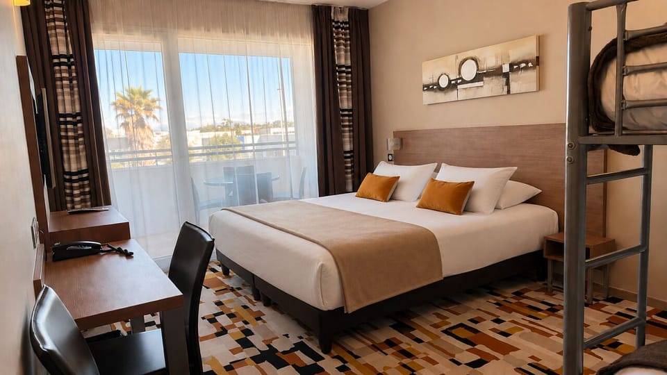 Family Room, Terrace | Premium bedding, in-room safe, desk, blackout drapes