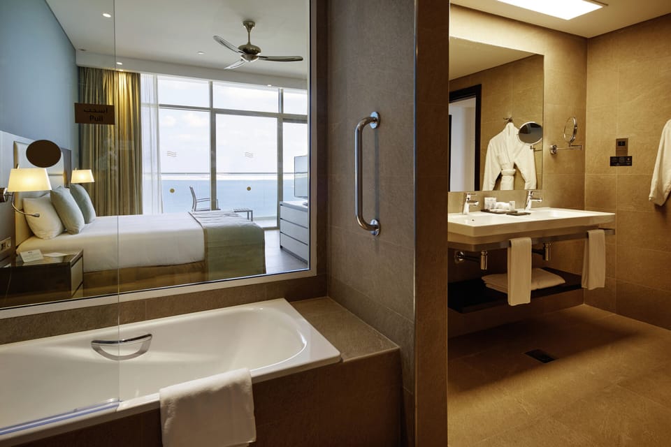 Shower, eco-friendly toiletries, hair dryer, towels