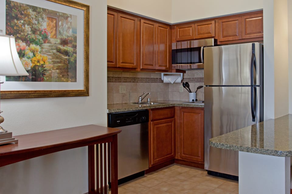 Fully equipped kitchen with modern appliances and ample counter space.