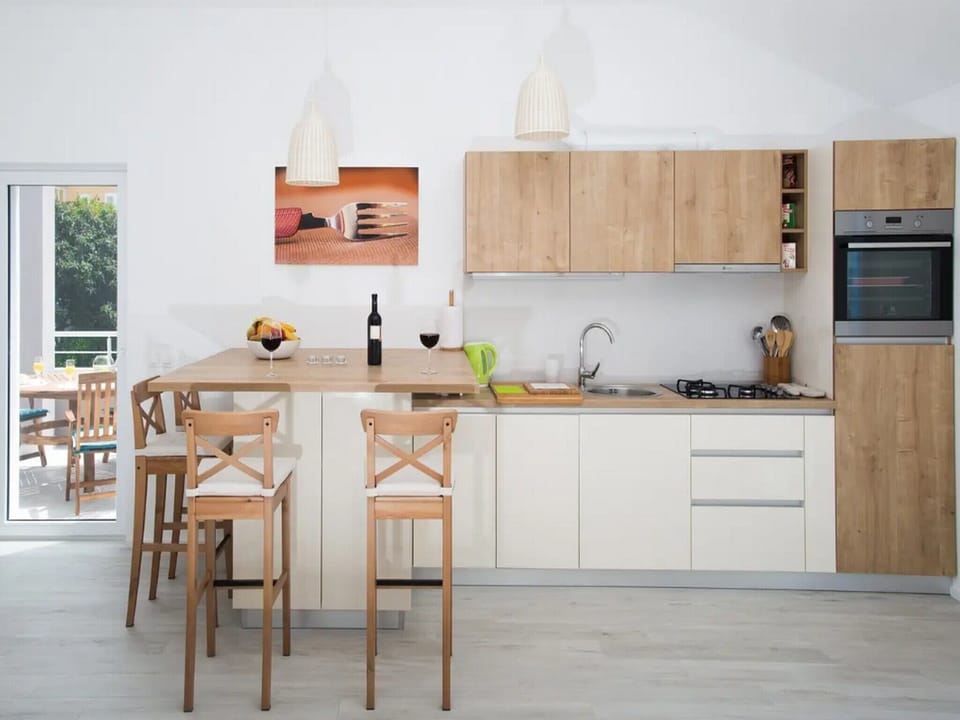 Apartment (Comfort One-Bedroom Apt) | Private kitchen | Fridge, oven, coffee/tea maker, freezer