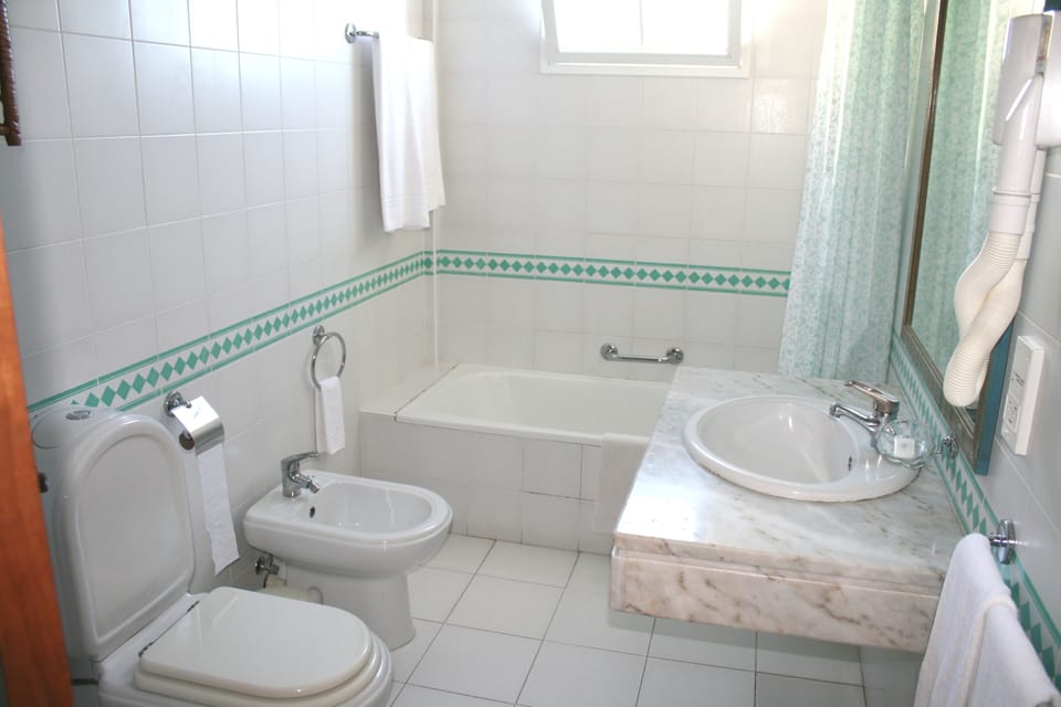 Apartment, 1 Bedroom | Bathroom | Separate tub and shower, hair dryer, bidet, towels