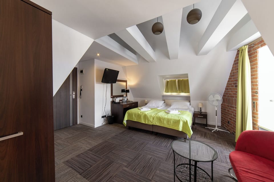Comfort Quadruple Room, Non Smoking, Bathtub | In-room safe, desk, laptop workspace, blackout drapes