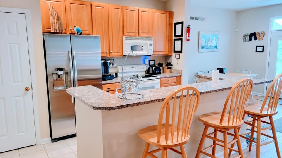 fully stocked kitchen with larger pantry