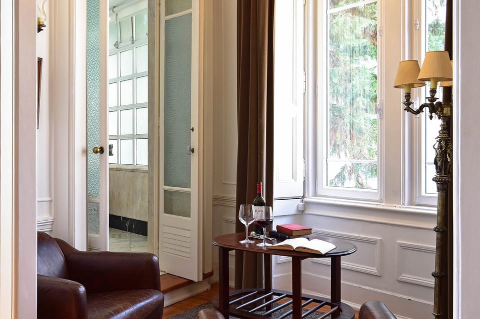 Charm Room | Living area | 100-cm flat-screen TV with satellite channels, TV