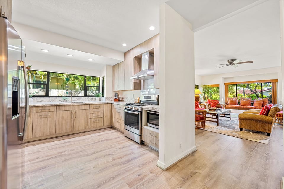 Well-stocked kitchen is located next to the living area