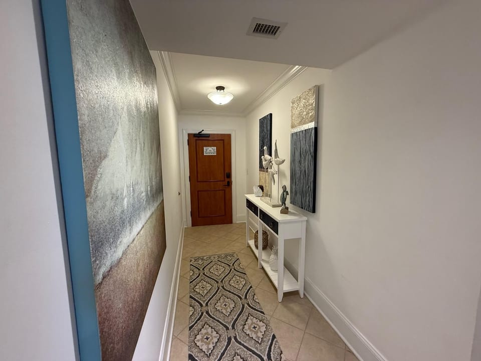 Bright, welcoming hallway with stylish decor and cozy lighting