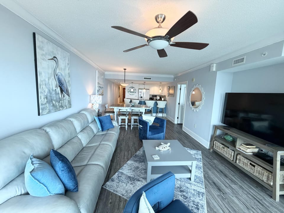 Spacious living room with cozy seating and modern decor