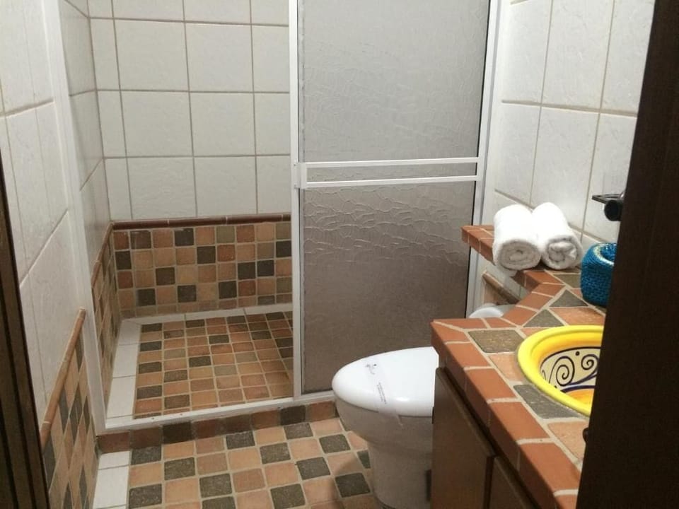 Family Quadruple Room | Bathroom | Shower, free toiletries, hair dryer, soap