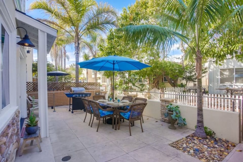 Front patio with outdoor dining table and BBQ!