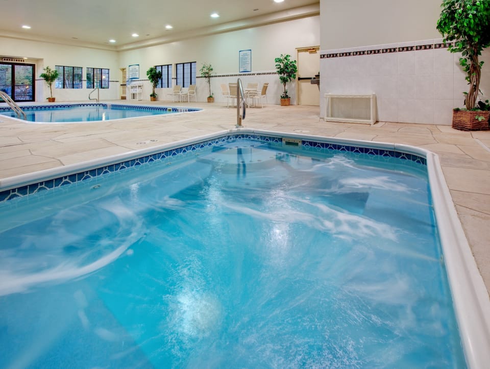 Soak and relax in the inviting hot tub, perfect for unwinding after a long day.