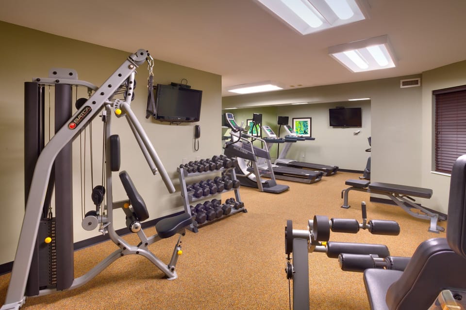 Stay fit with a variety of gym equipment, suitable for all workout routines.