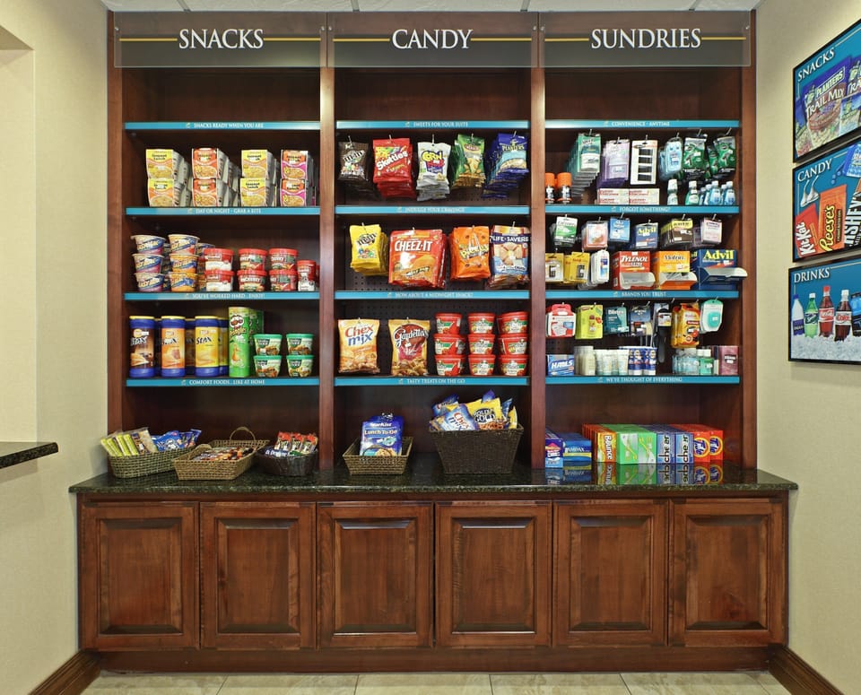 Grab a snack, a drink, or a travel essential — our on-site pantry has you covered.