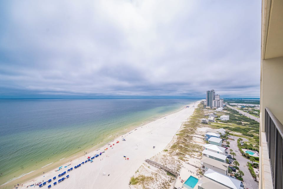 Breathe in the coastal vibes, soaking in the breathtaking view of the shore stretching endlessly