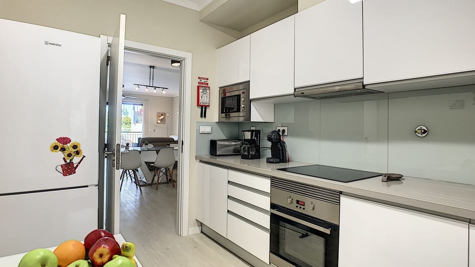 Morden fully equipped kitchen #kitchentable #coffeemachine #microwave #oven #fridge