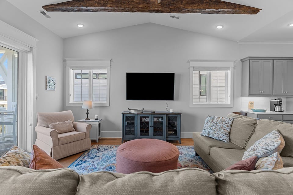 Sink into plush seating in the modern living space.