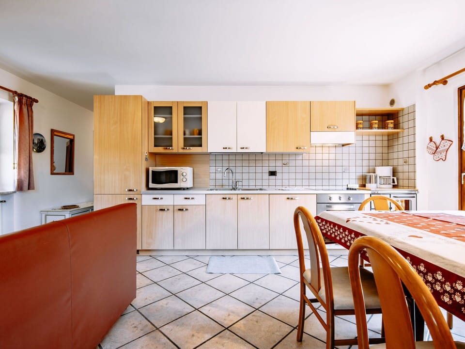 Cabinetry, Countertop, Furniture, Kitchen, Kitchen Stove, Chair, Wood, Kitchen Appliance, Flooring, Floor