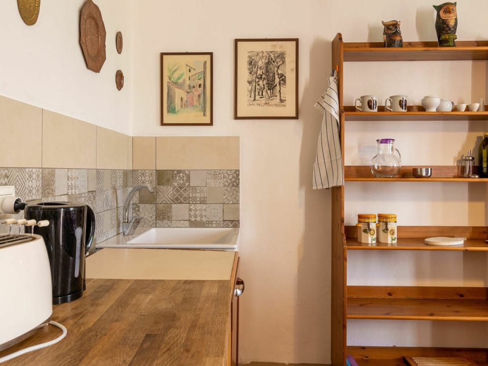 Brown, Property, Interior Design, Shelf, Wood, Picture Frame, Floor, Wall, Home Appliance, Flooring