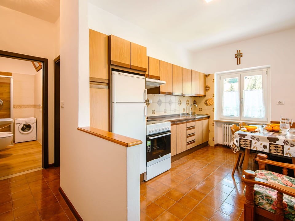 Cabinetry, Furniture, Countertop, Kitchen, Kitchen Stove, Wood, Orange, Kitchen Appliance, Drawer, Wood Stain